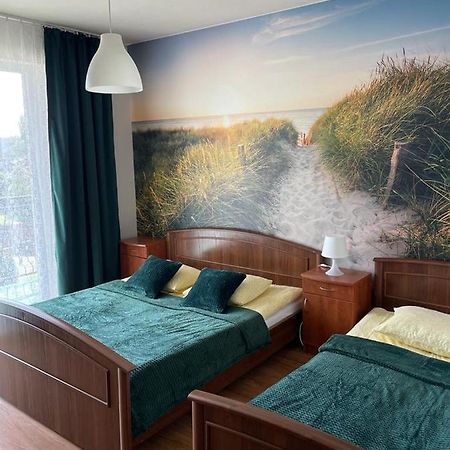 Emada- Pokoje Goscinne I Studia Ostrowo  Exteriör bild