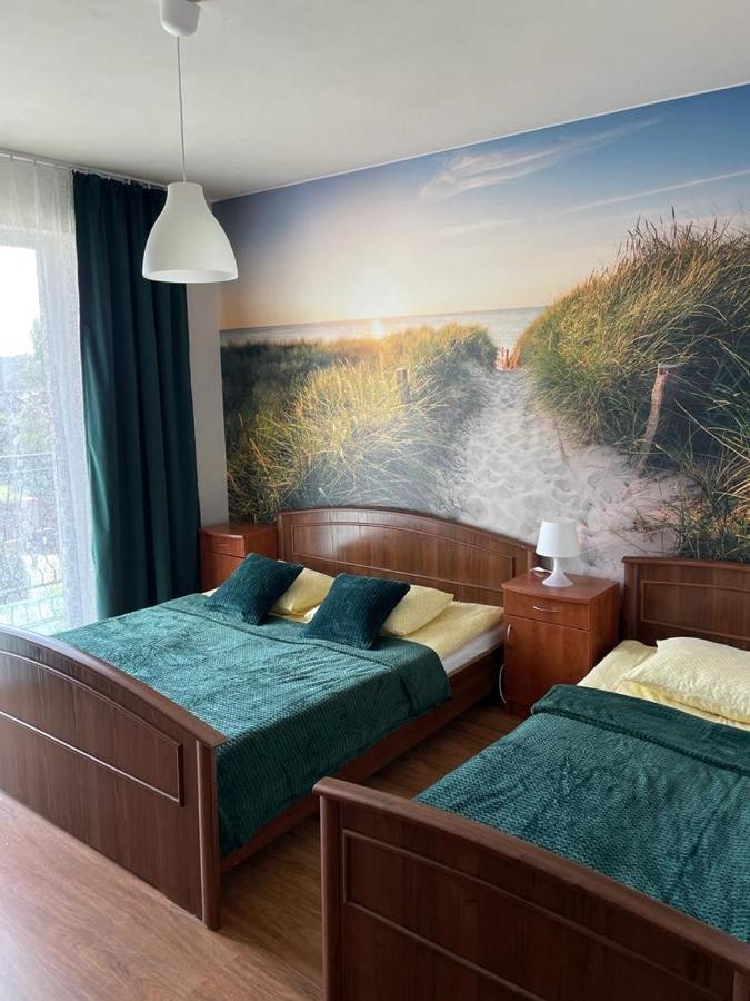 Emada- Pokoje Goscinne I Studia Ostrowo  Exteriör bild