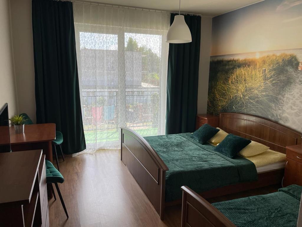 Emada- Pokoje Goscinne I Studia Ostrowo  Exteriör bild